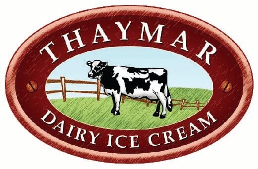 Thaymar Dairy Ice Cream - a cow standing by a fence